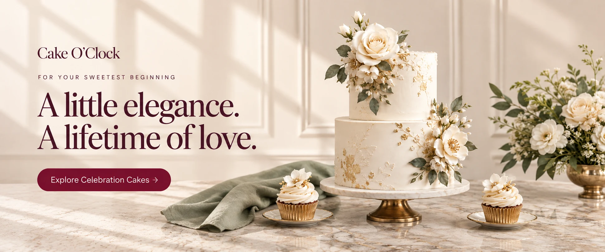 Cake O Clock — For your sweetest beginning A little elegance. A lifetime of love. Explore celebration cakes. Two tier ivory celebration cake with sugar flowers